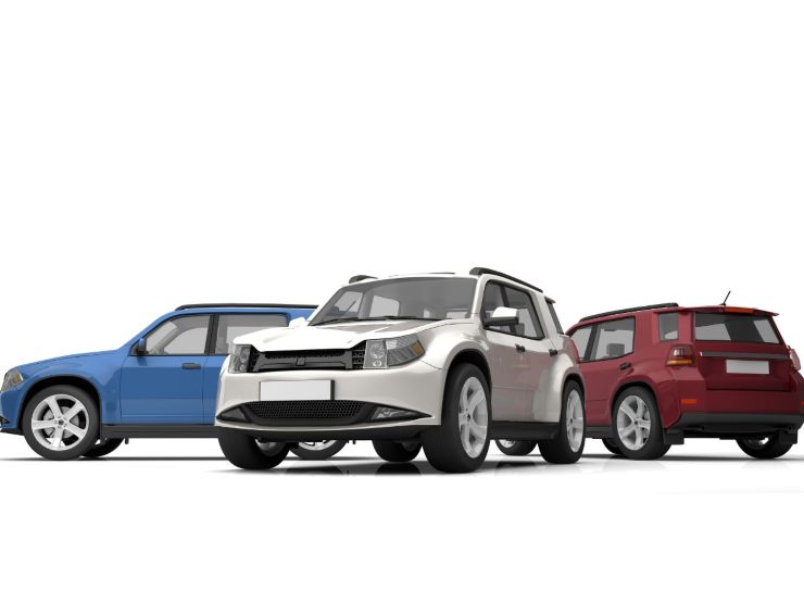 tre auto parcheggiate