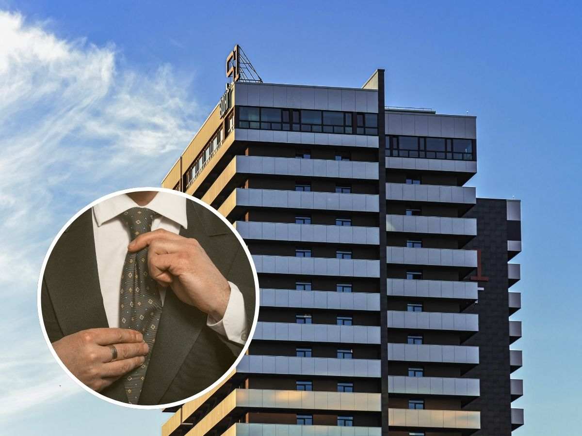 sfondo condominio e tondo con uomo che si aggiusta cravatta