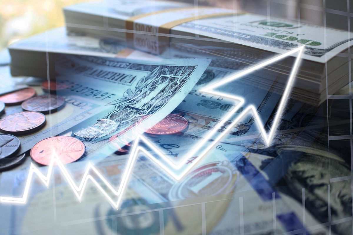 Dollari e freccia verso l'alto