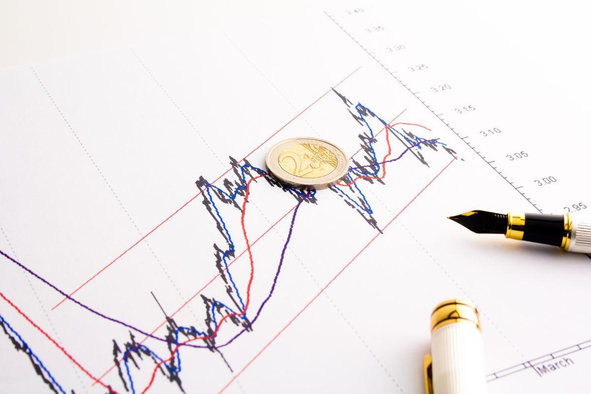 Grafico e moneta da due euro