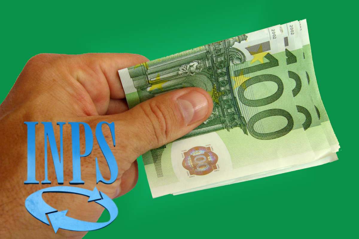 mano con banconote da 100 euro e scritta inps