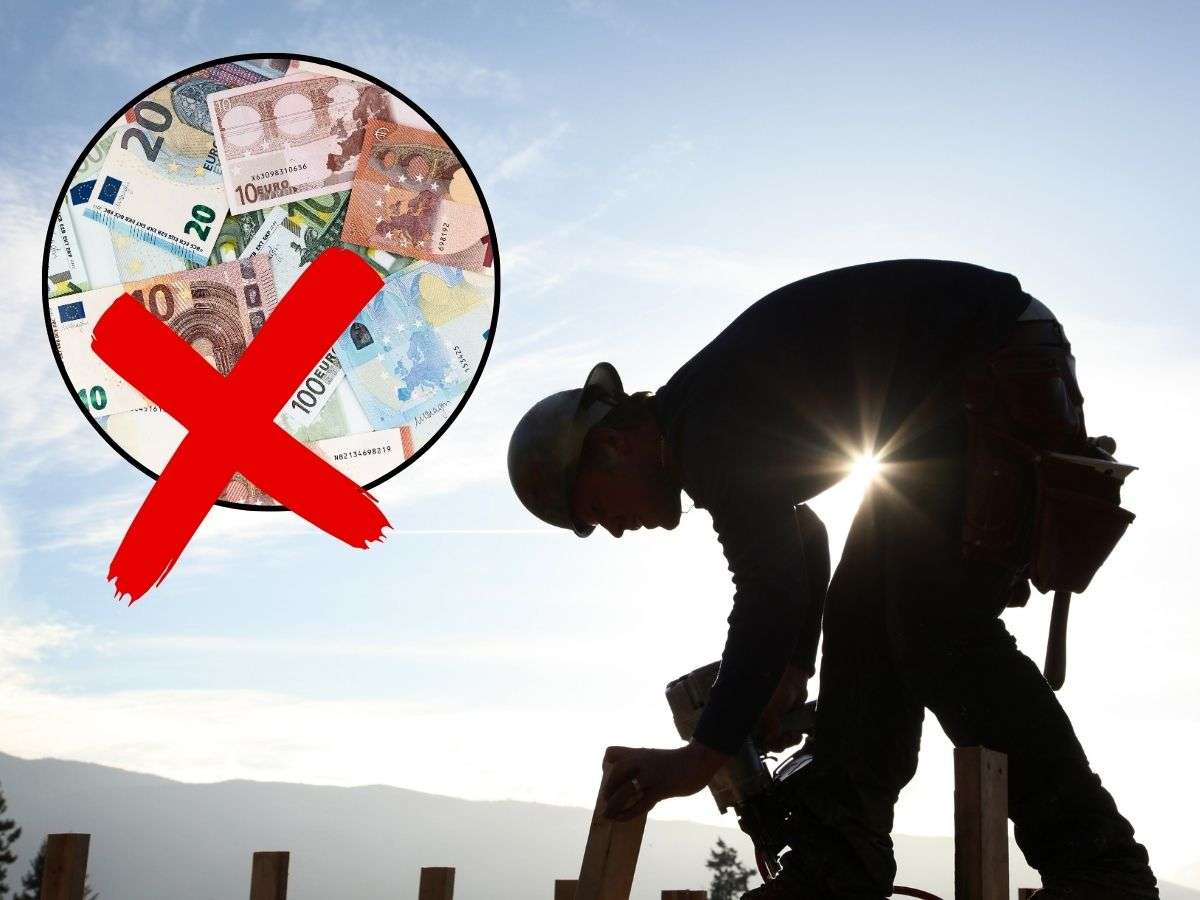 sfondo lavoratore e tondo con banconote euro e X rossa