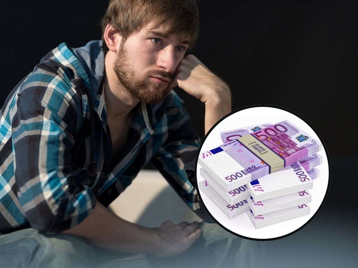 sfondo ragazzo triste e tondo con banconote 500 euro