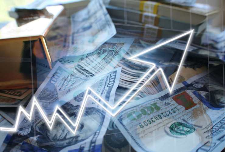 dollari e freccia al rialzo