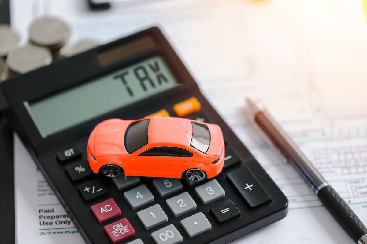 Calcolatrice con scruitta TAX , auto 